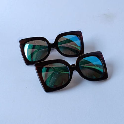 Feline Flair: Chic Cat-Eye Mirror Sunglasses